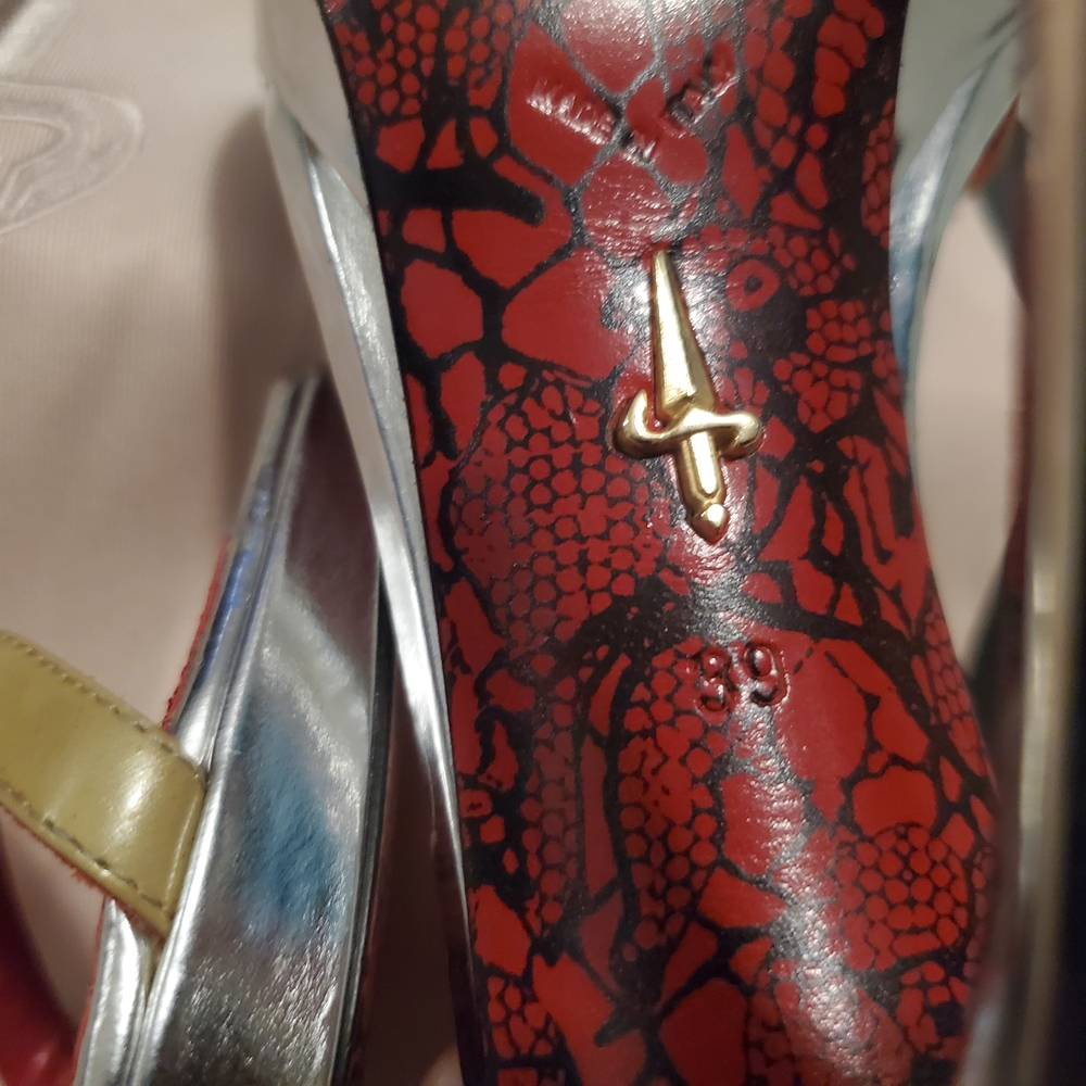 New Cesare Paciotti Chrome Heels